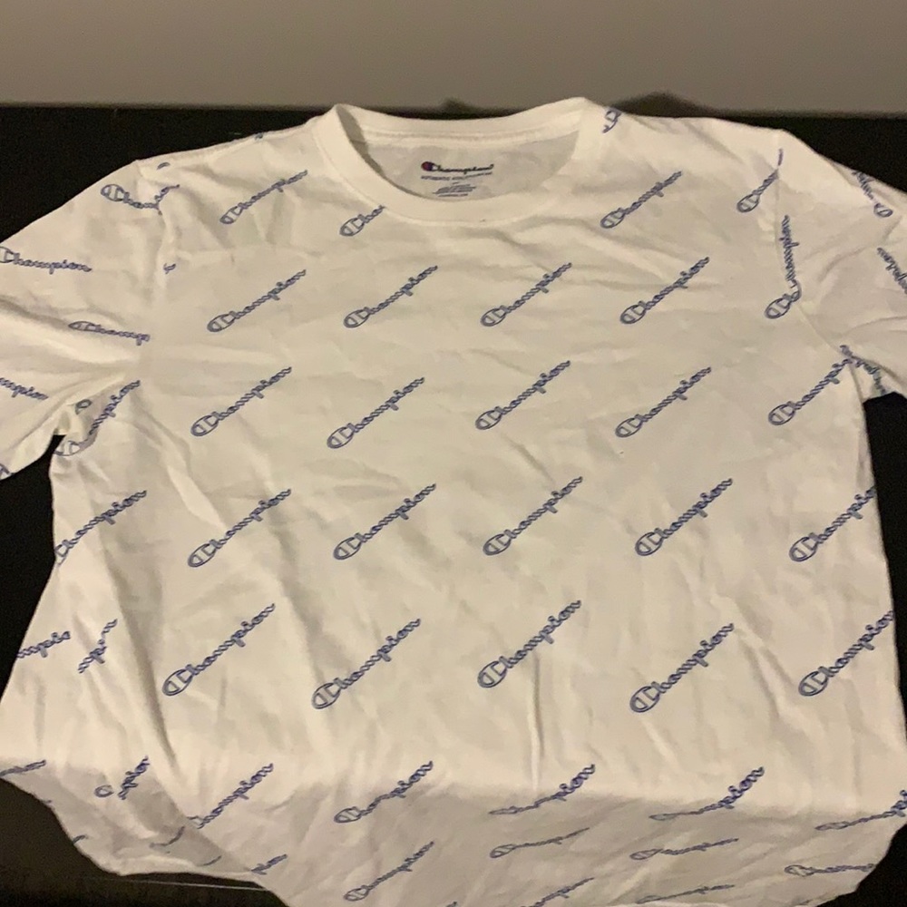 blue and white champion logo tee
